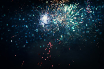 abstract holiday background, glitter lights and firework