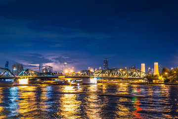 Bangkok Landmark night scene of Phra Phuttha Yodfa Bridge, Memorial Bridge or Saphanput