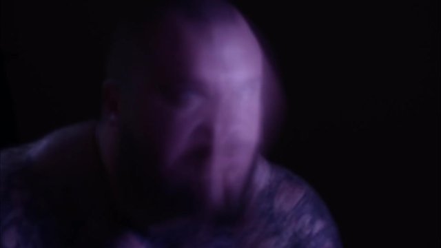 Tattooed psycho man. Timelapse.