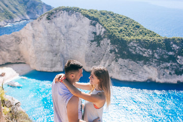 Travelers on the Background Incredible Navagio Beach or Shipwreck Beach. Zakynthos, Greece.