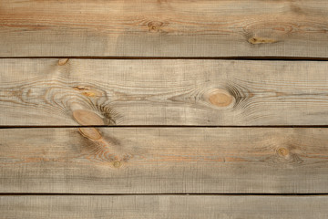 background from several horizontal wooden planks of pine