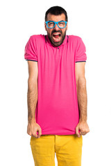 Fototapeta premium Frustrated man with colorful clothes