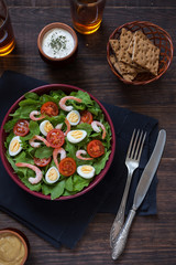 Bowl of fresh salad with shrimps