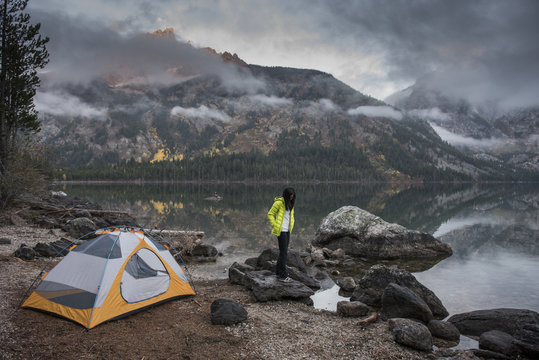 Woman camping at Jackson Hole, Jenny Lake, Grand Teton, Wyoming, United States of America 