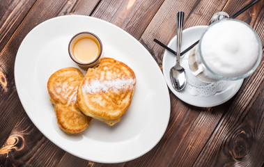 Fried fritters on plate