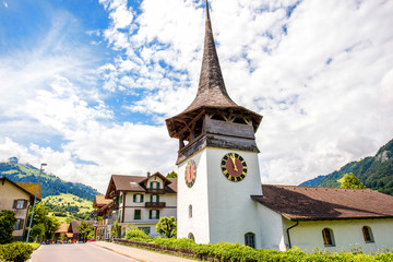 Fototapeta na wymiar Ancient wooden church in the mountain village near Interlaken city in Switzerland