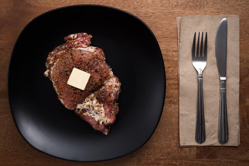 raw pork steak still life on wooden background