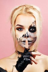 Girl with streaks on the face for Halloween
