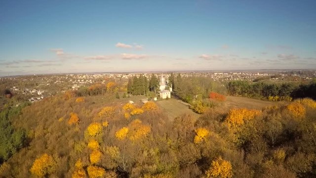 Aerial view of woods and a church