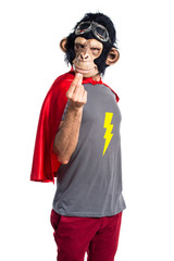 Superhero monkey man doing money gesture