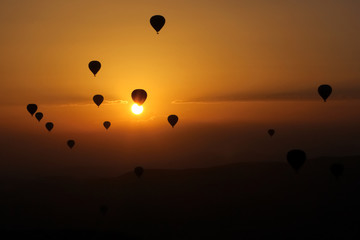 Balloons at sunrise. Backlight. Turkey. Cappadocia.