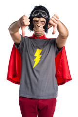 Fototapeta premium Superhero monkey man doing bad signal