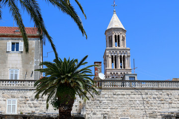 Fototapeta na wymiar Saint Domnius bell tower is landmark in Split, Croatia. View from Riva promenade. Split is popular touristic destination and UNESCO World Heritage Site.