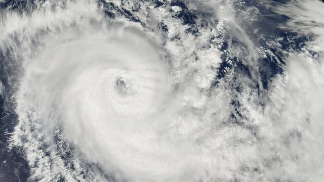 Hurricane Storm, over the earth, satellite view. Elements of this image furnished by NASA
