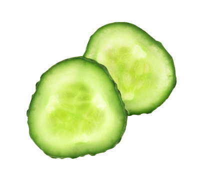 Two fresh slices of cucumber close-up isolated on white backgrou