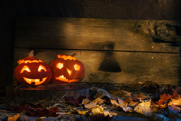 Halloween pumpkin head jack lantern on wooden background