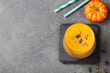 Pumpkin smoothie, pie with spices Copy space