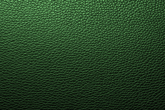 Green leather texture or leather background for design with copy space for text or image.
