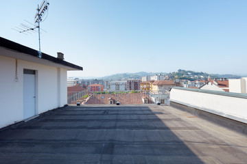 Fototapeta na wymiar Large rooftop balcony in a sunny day