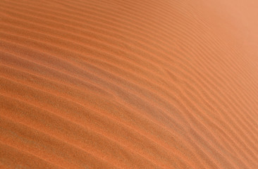Background red desert sand in Dubai at sunset
