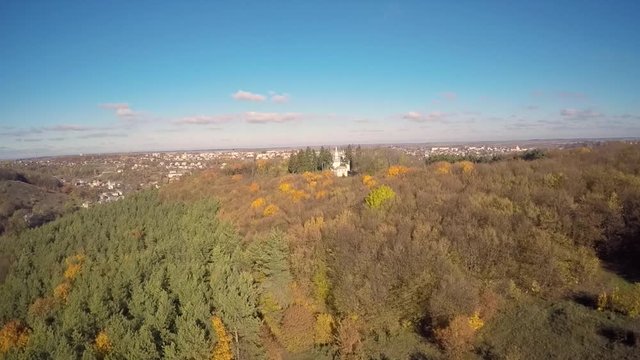 Aerial view of a church in the woods