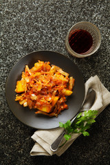 steamed vegetables: cabbage, onions, carrots, potatoes in tomato