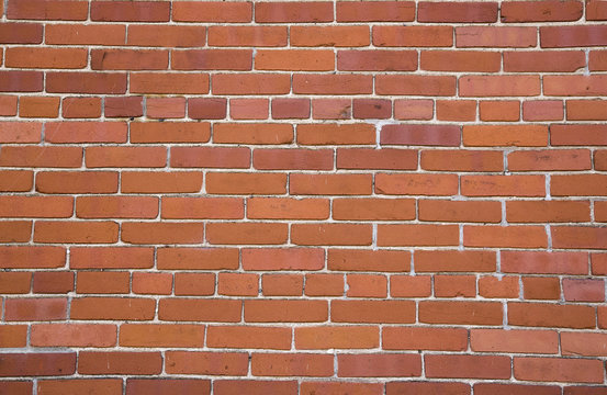 Textured brick wall background.