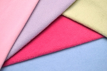 Colored fleece fabric background, pile fleece fabric © Ludaiv