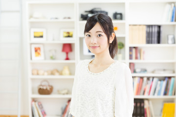 portrait of attractive asian woman in the living room