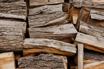 Chopped fire wood in the autumn, prepared for winter, texture, wallpaper