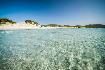 Fototapeta na wymiar Transparent sea and crystal clear water of Sardinia.