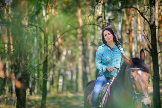 girl astride a horse