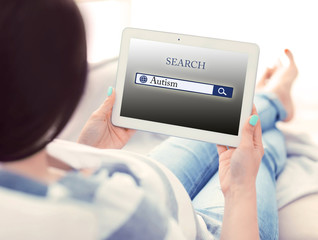 Pregnant woman with tablet. Children autism concept
