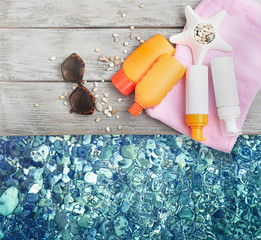 Summer beach set on swimming pool water background