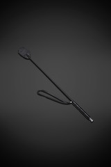 black leather whip, sexual fetish, isolated on white background