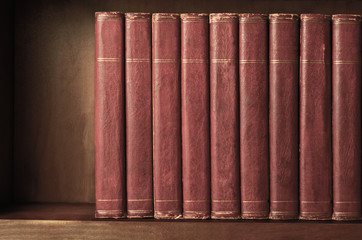 Row of Old Books on Shelf with Vintage Effect