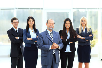 boss and business team on office background