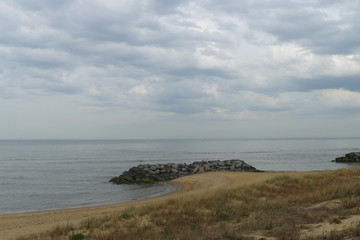 Fototapeta na wymiar Ocean and Little Breakwater Near Virginia Beach