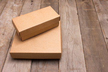 cardboard box on wooden background