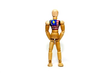 Wooden puppet with Malaysia flag on body