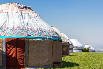 village of yurts in the mountain pastures in Asia