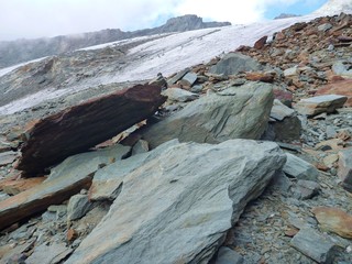 climbing rocky route to the grossglockner mountain