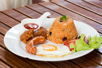American fried rice on wooden table

