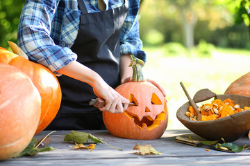Fototapeta premium carve pumpkins for Halloween