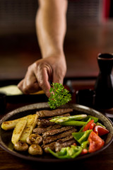 Assorted delicious grilled meat with vegetables