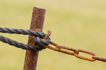 Old chain with rust, steel chain link fence