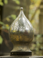 A detail of the wrought iron fence of the railing