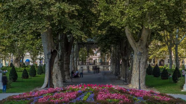 People around pavillion in Zrinjevac park timelapse in Zagreb, Croatia.