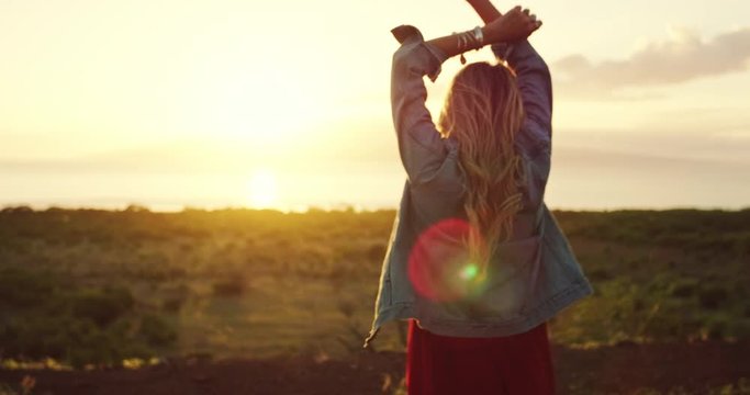 Beautiful happy carefree young woman at sunset, fashion lifestyle