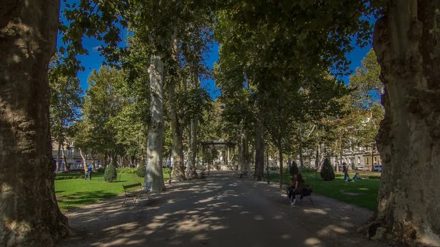 People around pavillion in Zrinjevac park timelapse hyperlapse in Zagreb, Croatia.
